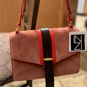 INZI orange Suede purse with leather and gold color accents
